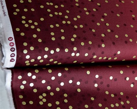 maroon cotton fabric with gold metallic dots|maroon and gold fabric.